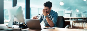 A financial professional is overworked because of his company's shortage of accountants.