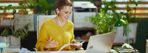 A woman is pleased that customer support is answering her question.