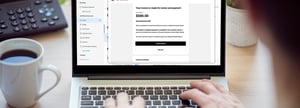 A customer making a monthly online payment to an MSP using accounting automation