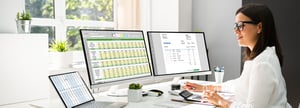 A person using accounting automation to better manage finances and cash flow.