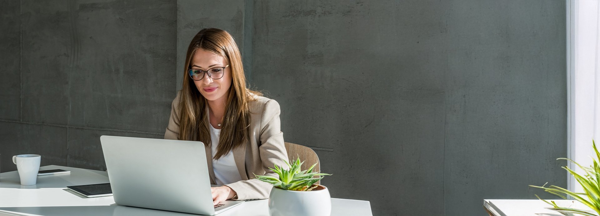 Businesswoman typing on computer