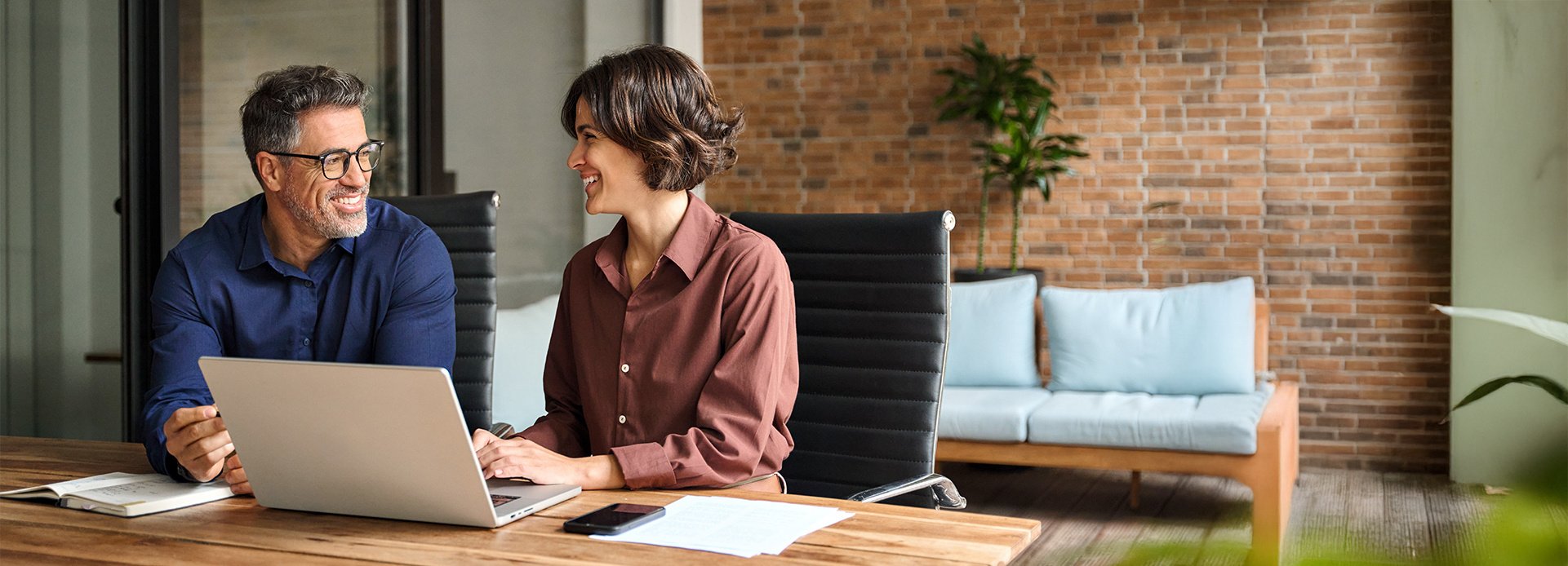 Accountants smiling in an office